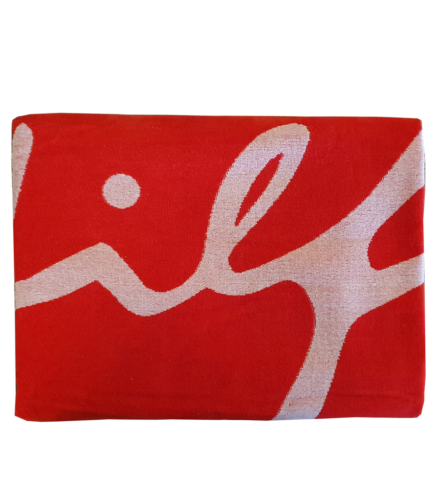 T H signature beach towel